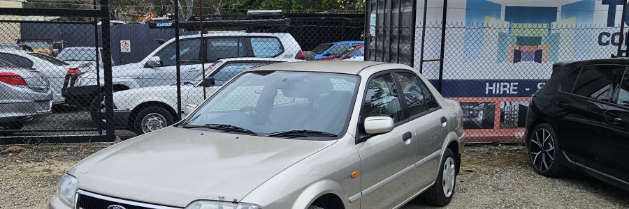 ford laser,auto low km