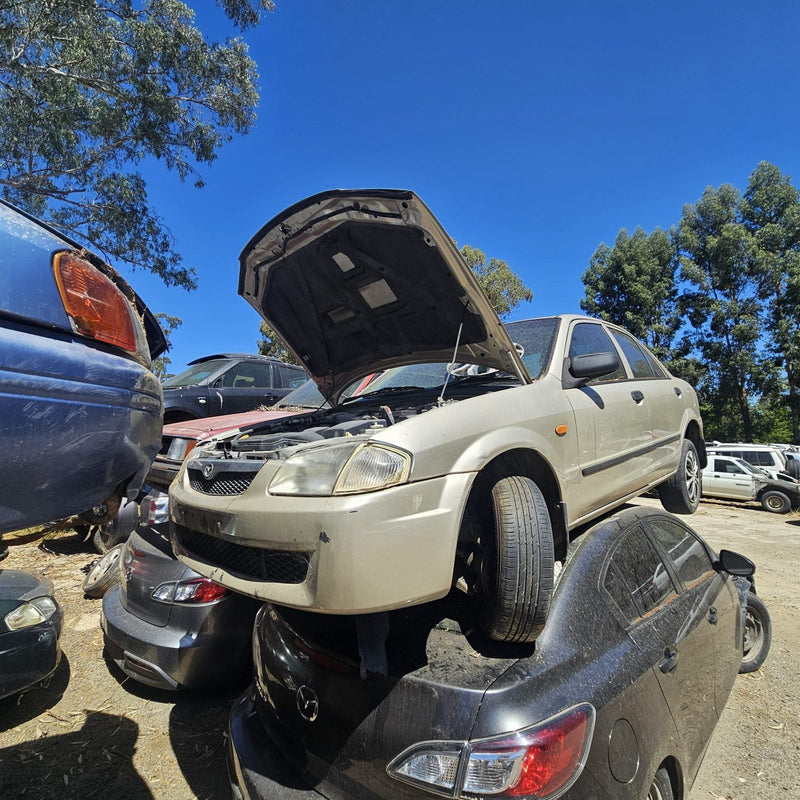 Mazda 2, 3, 6, 323 and CX-7 in the yard