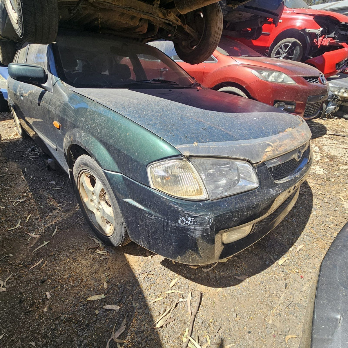 Mazda 2, 3, 6, 323 and CX-7 in the yard, photo 4 of 16