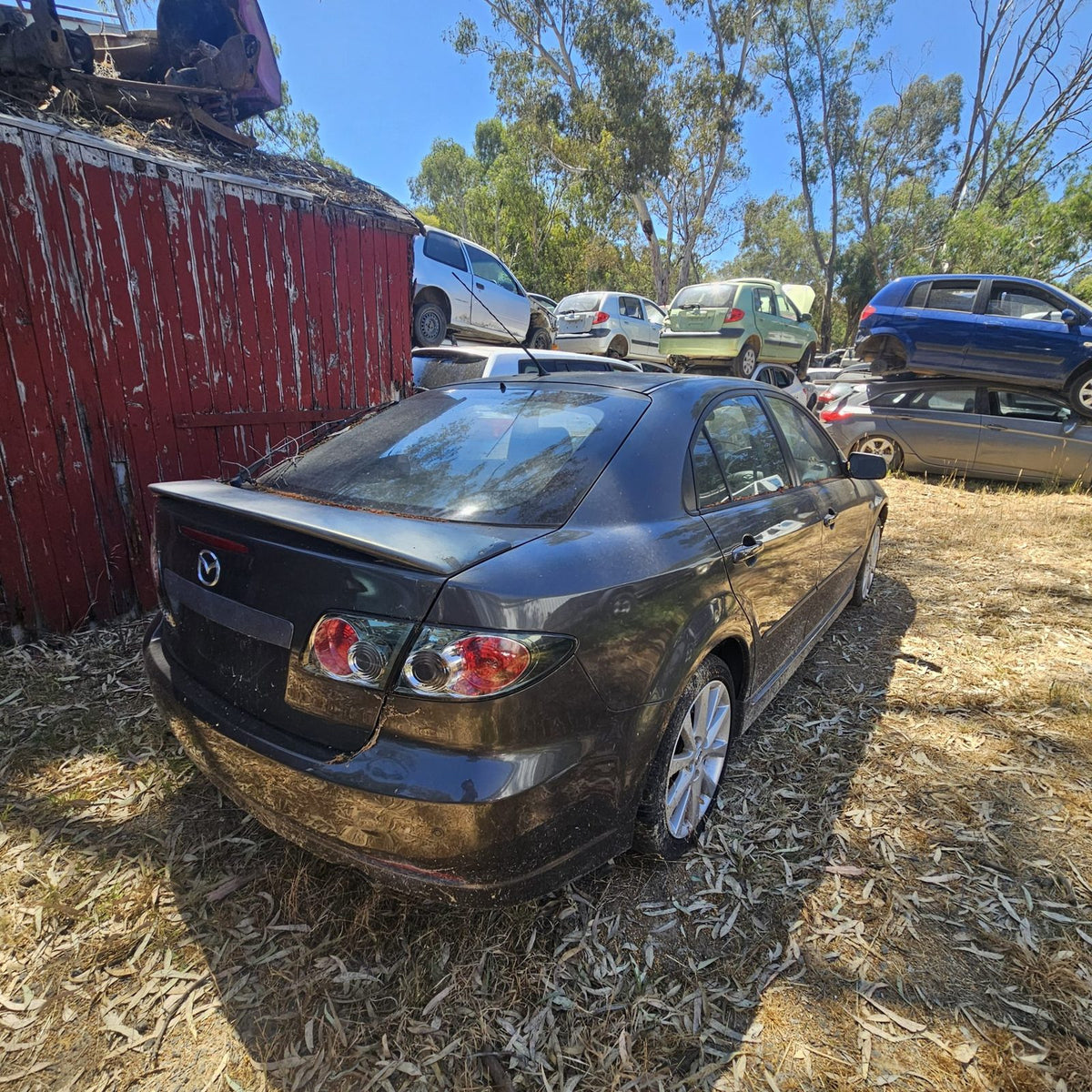 Mazda 2, 3, 6, 323 and CX-7 in the yard, photo 8 of 16