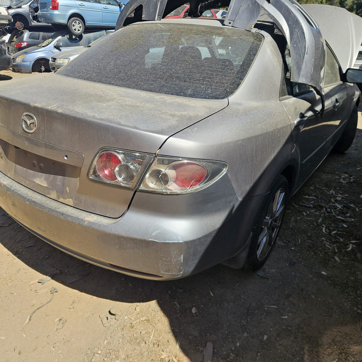 Mazda 2, 3, 6, 323 and CX-7 in the yard, photo 9 of 16