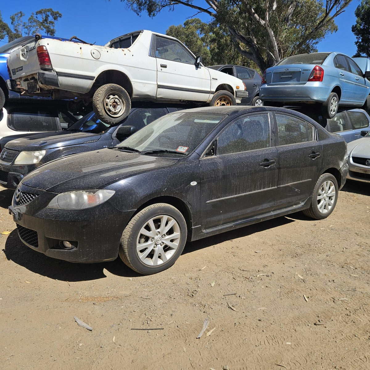 Mazda 2, 3, 6, 323 and CX-7 in the yard, photo 10 of 16