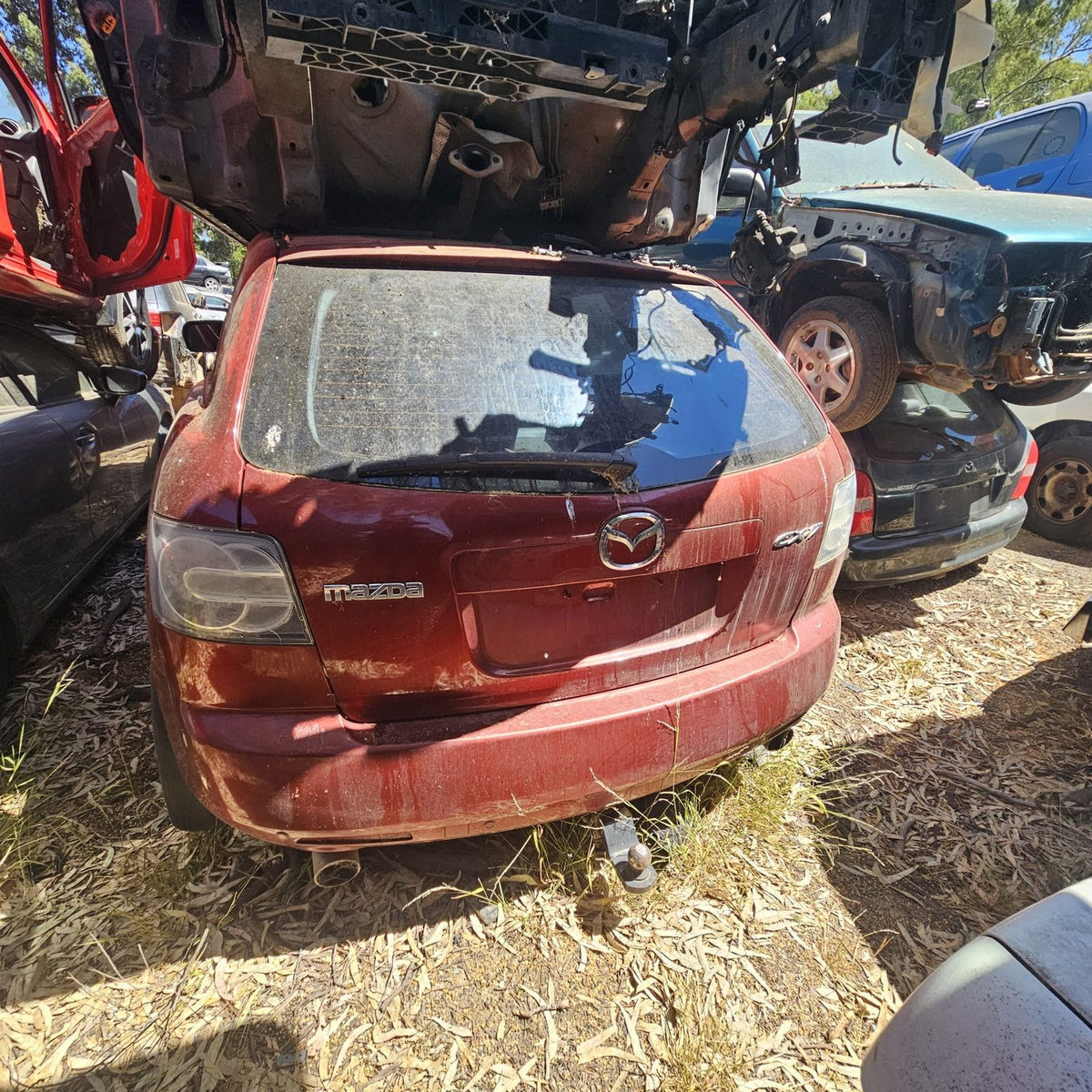 Mazda 2, 3, 6, 323 and CX-7 in the yard, photo 12 of 16