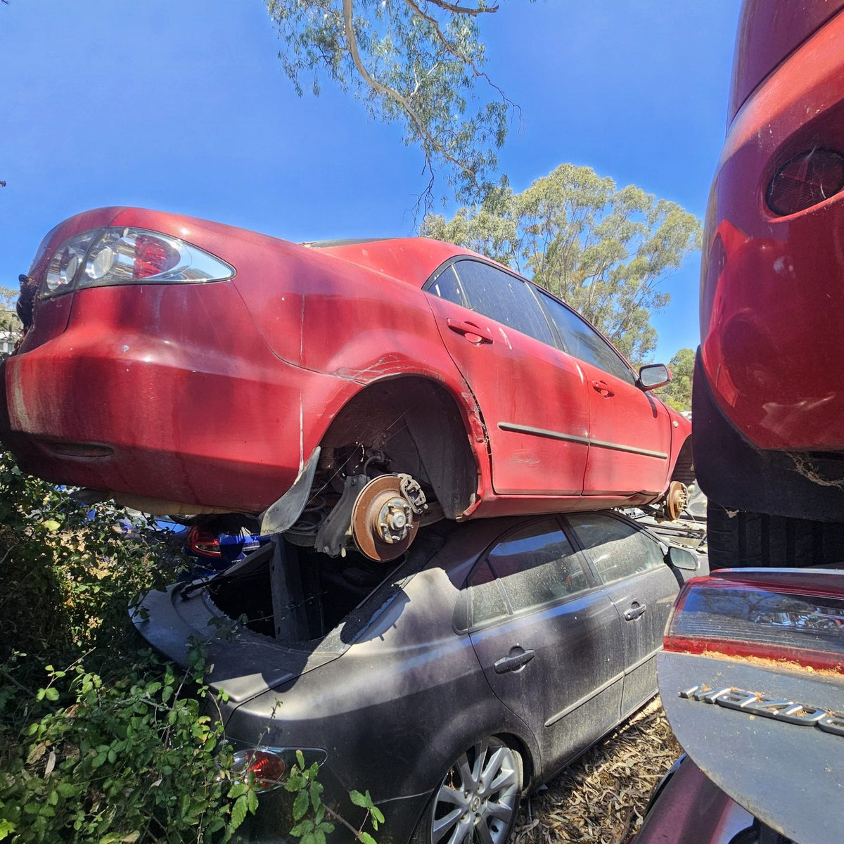 Mazda 2, 3, 6, 323 and CX-7 in the yard, photo 13 of 16